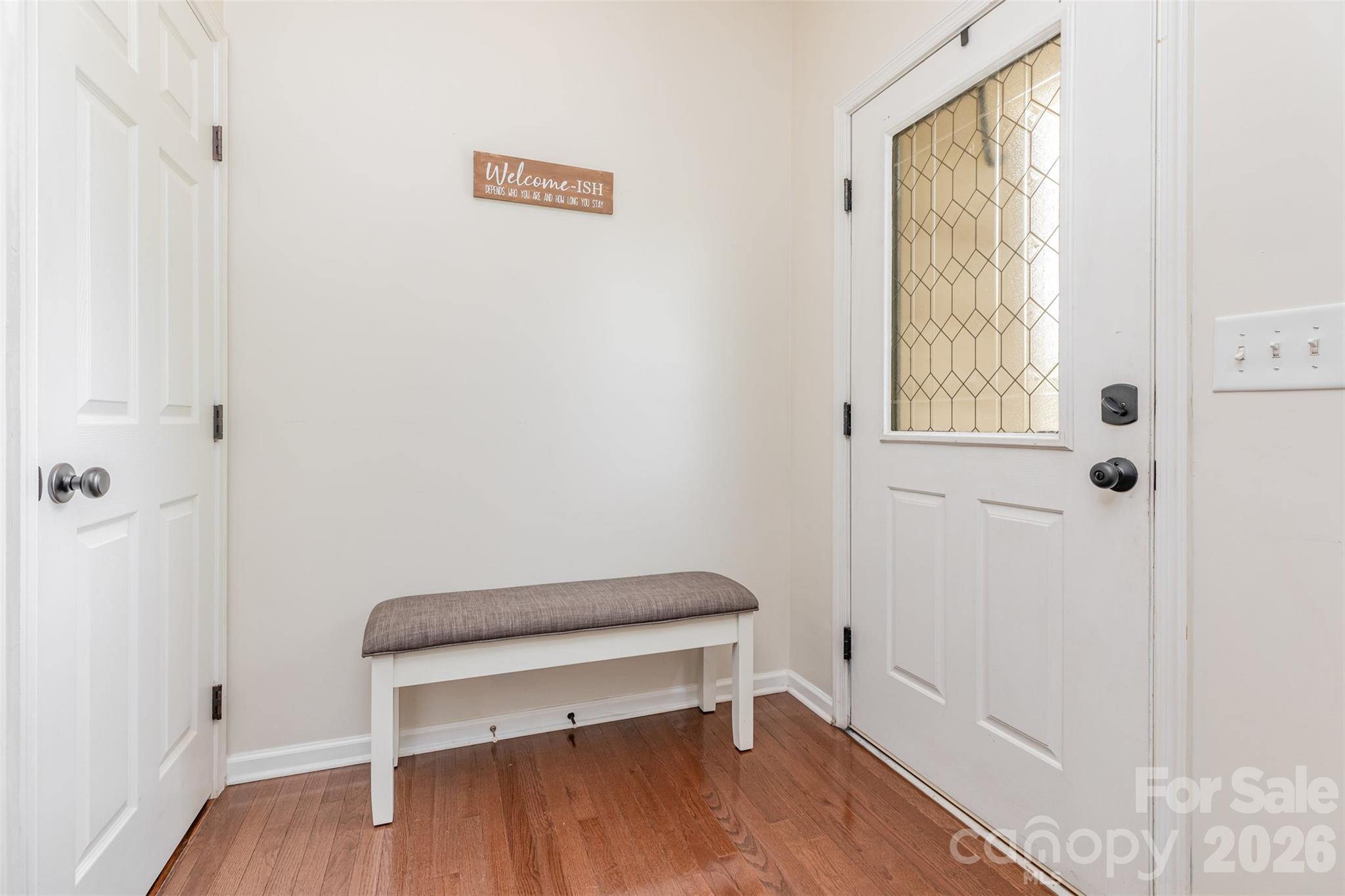 353 Chorus Road Fort Mill, SC 29715 - Photo 2 of 30 a view of a room with wooden floor and small window