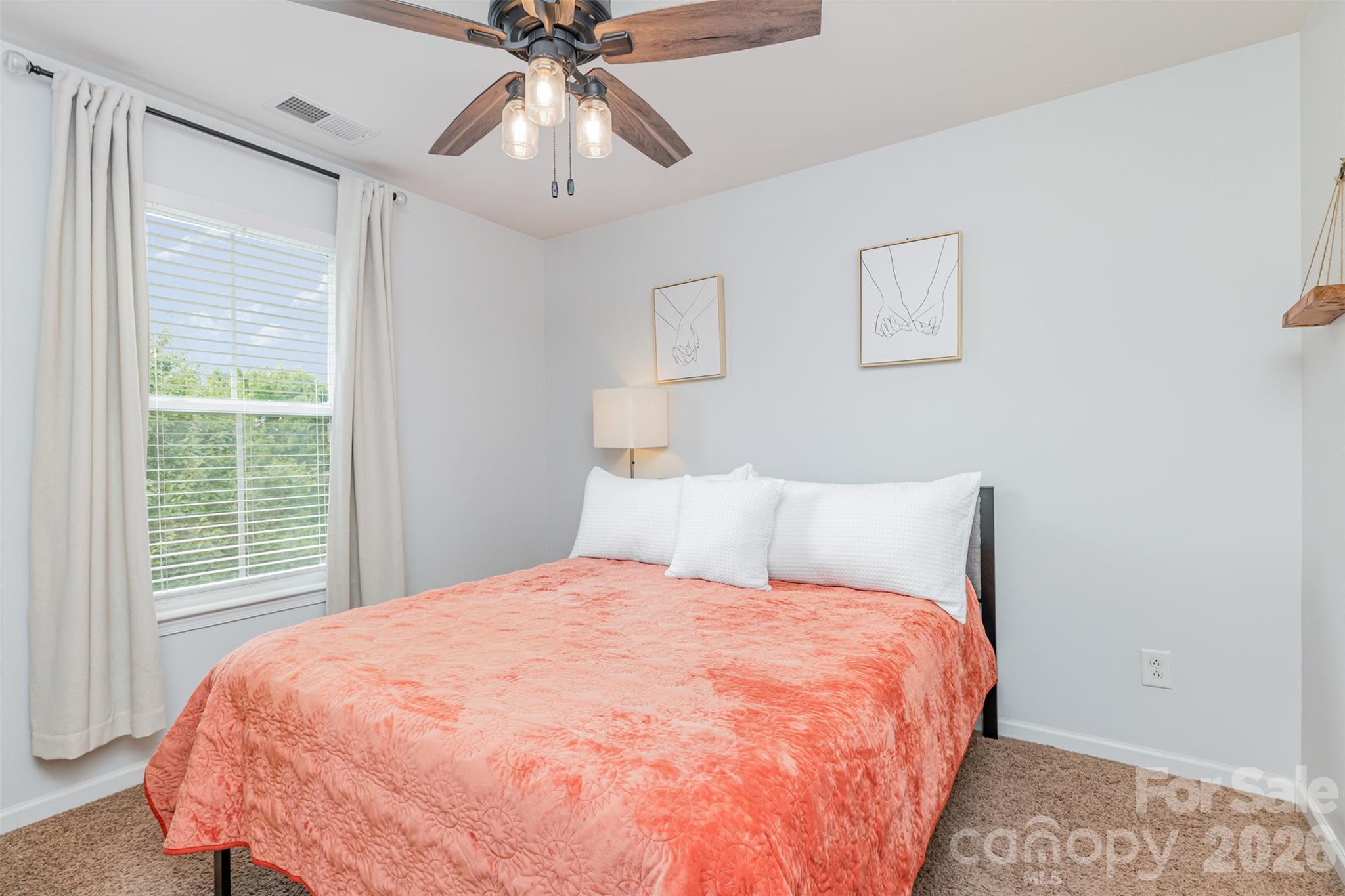 353 Chorus Road Fort Mill, SC 29715 - Photo 26 of 30 a large bed sitting in a bedroom next to a window