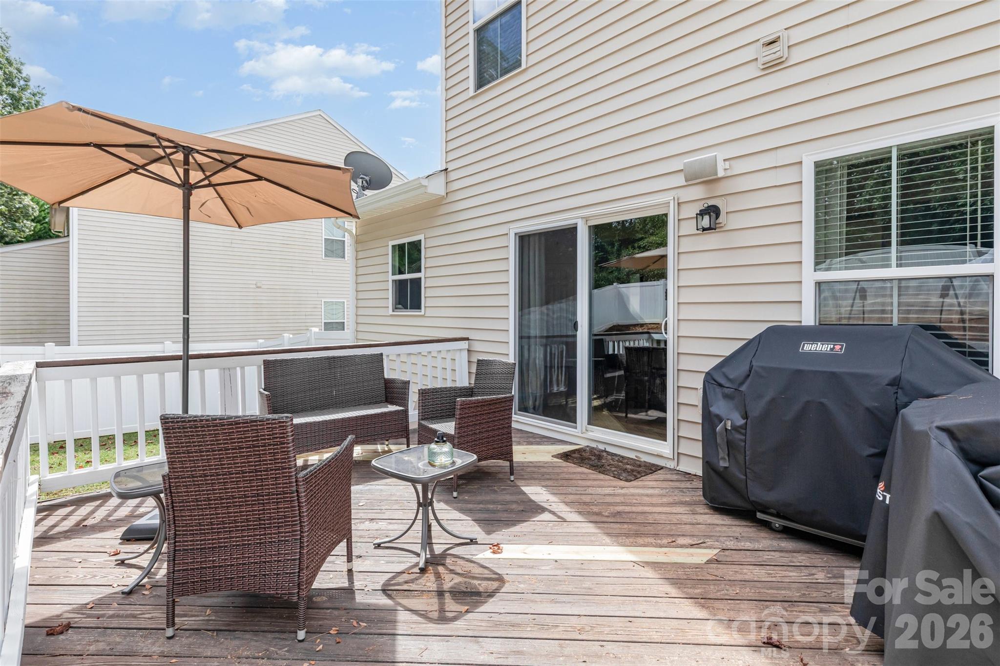 353 Chorus Road Fort Mill, SC 29715 - Photo 28 of 30 a view of a chair and table on the deck