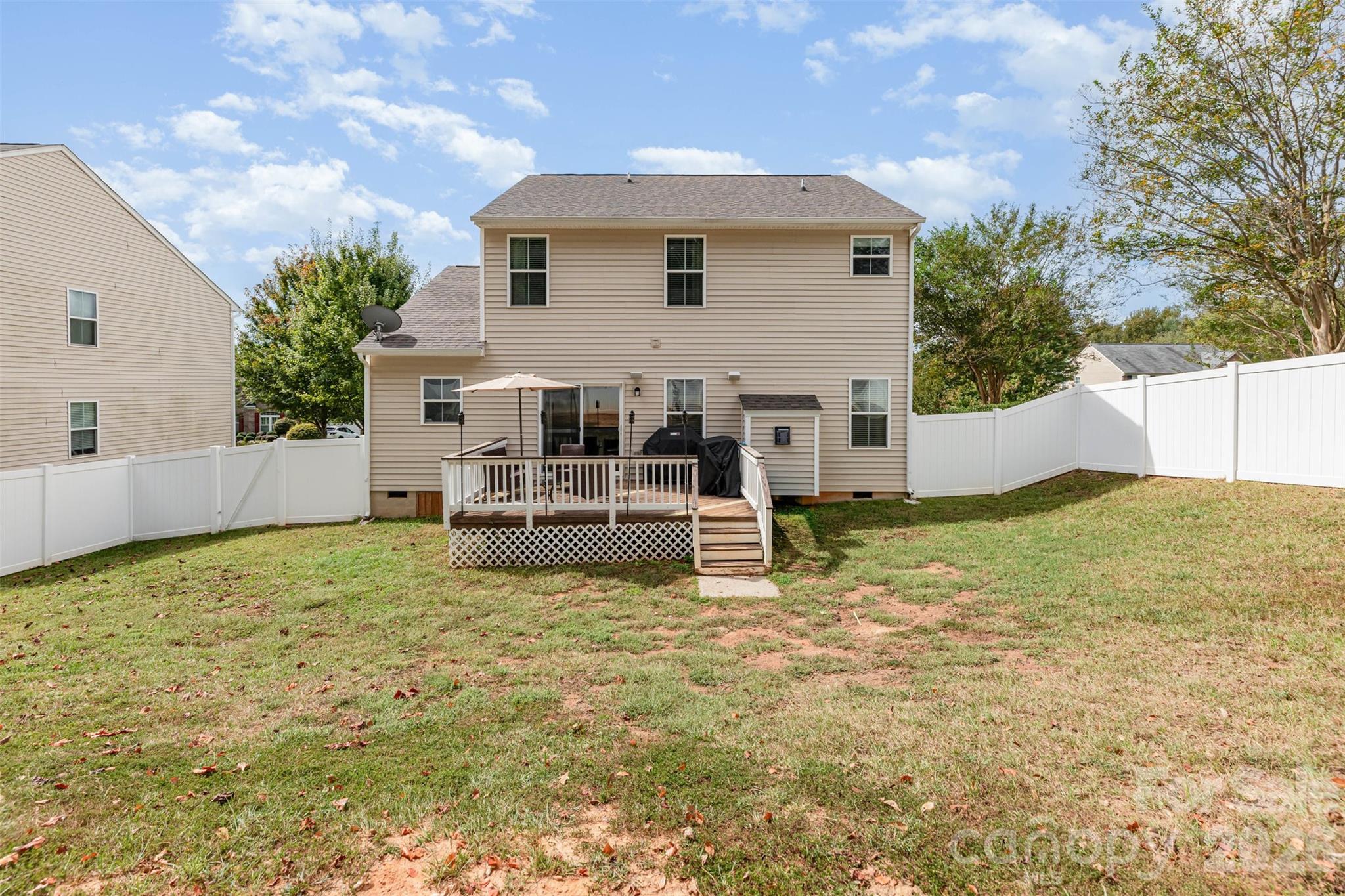 353 Chorus Road Fort Mill, SC 29715 - Photo 29 of 30 a view of a house with backyard and sitting area