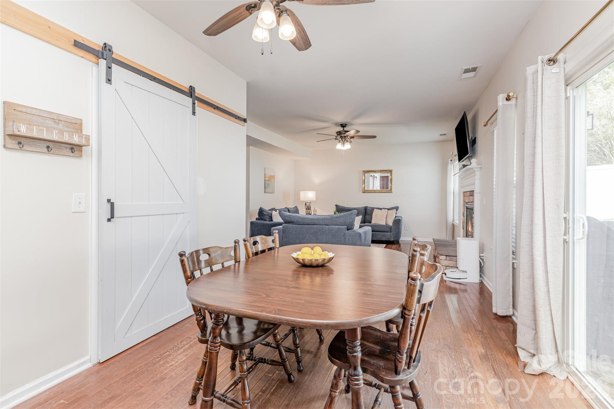 353 Chorus Road Fort Mill, SC 29715 - Photo 10 of 30 a view of a dining room with furniture and a chandelier