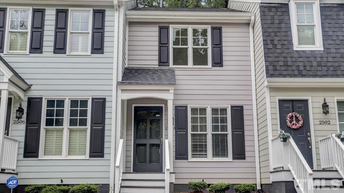 2504 Noble Road Raleigh, NC 27608 - Photo 1 of 28 a front view of a house with a large windows