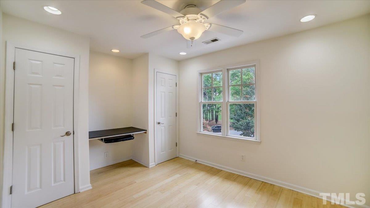 2504 Noble Road Raleigh, NC 27608 - Photo 20 of 28 a view of an empty room with a window