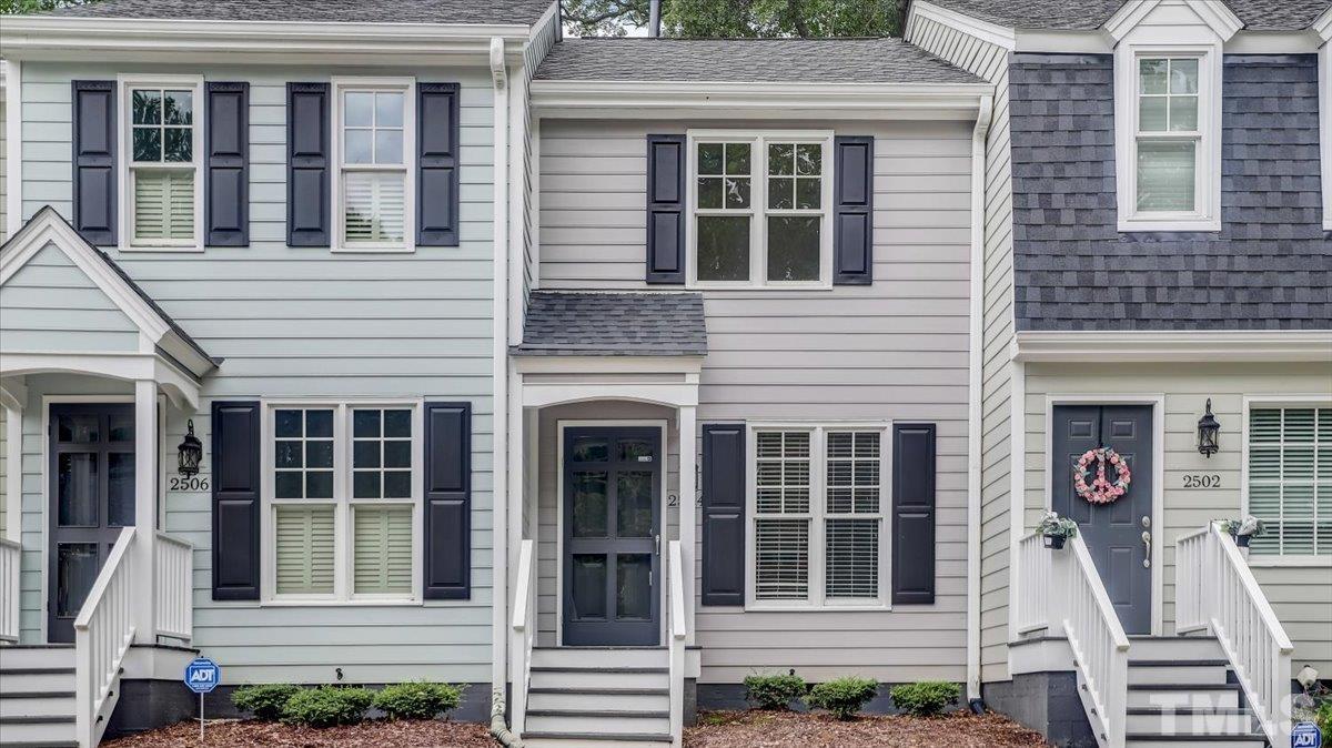 2504 Noble Road Raleigh, NC 27608 - Photo 2 of 28 a view of a brick house with large windows