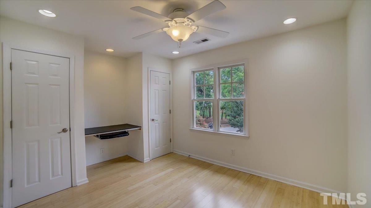 2504 Noble Road Raleigh, NC 27608 - Photo 21 of 28 a view of an empty room with a window