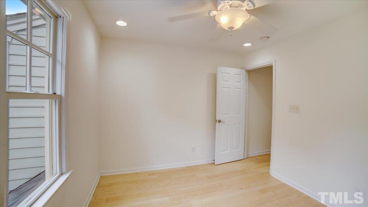 2504 Noble Road Raleigh, NC 27608 - Photo 23 of 28 a view of an empty room with a window