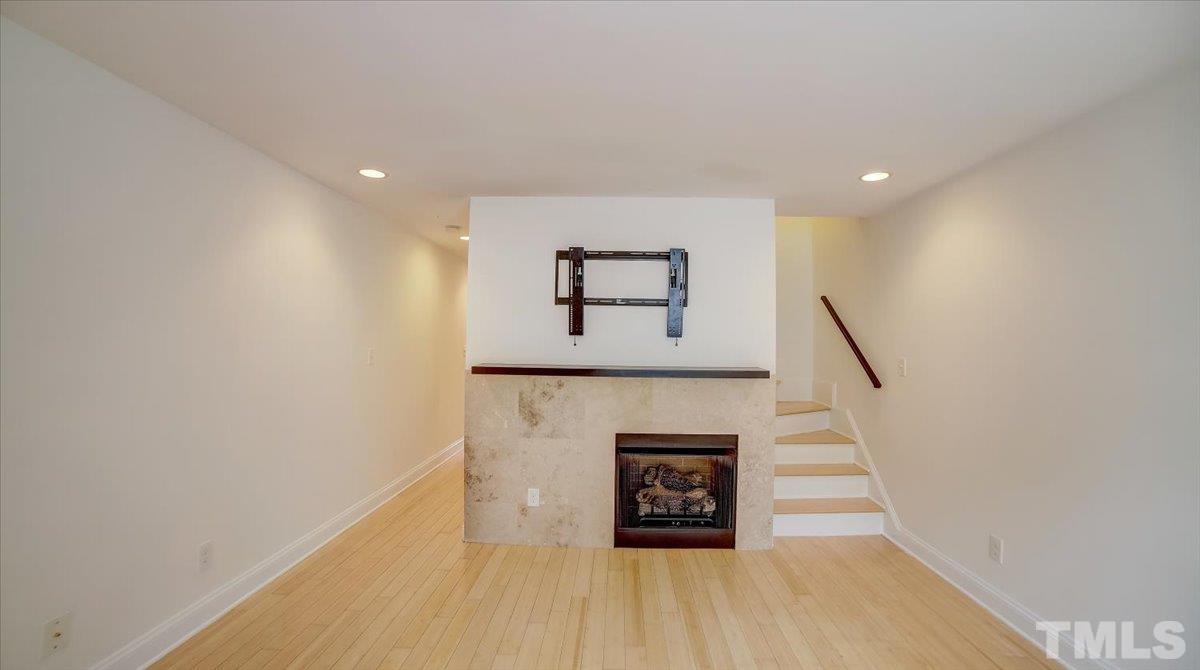 2504 Noble Road Raleigh, NC 27608 - Photo 7 of 28 a view of entryway with wooden floor