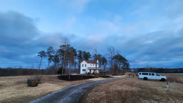 a view of a house with a porch