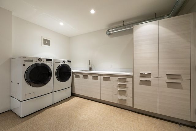 a utility room with dryer and washer