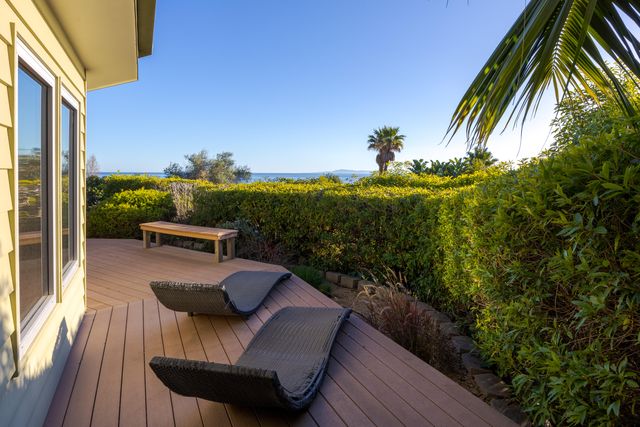a view of balcony with furniture and outdoor space