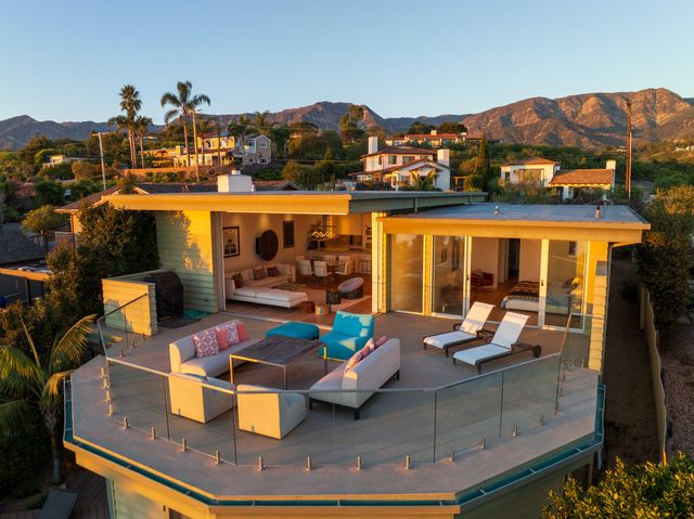 a view of a building with sitting area