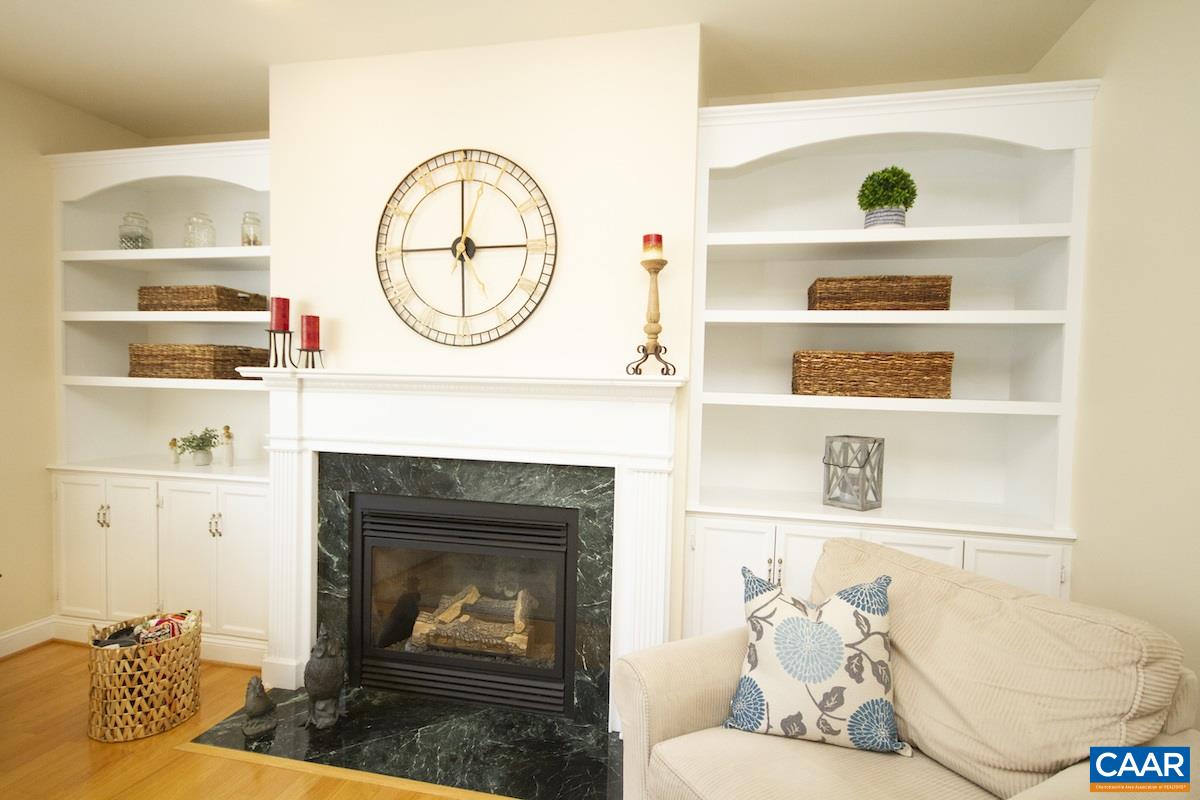1380 Amber Ridge Road Charlottesville, VA 22901 - Photo 15 of 35 a living room with furniture and a fireplace