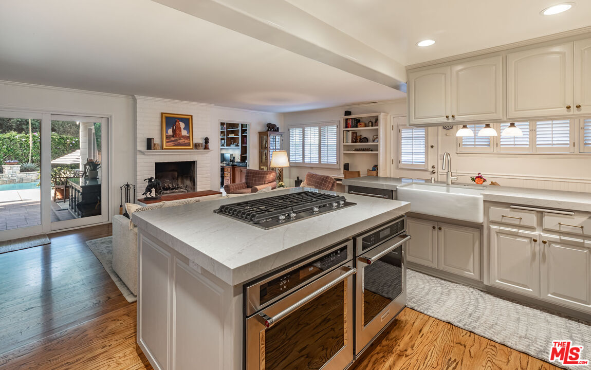 875 Hugo Reid Drive Arcadia, CA 91007 - Photo 13 of 53 a kitchen with a stove and a sink