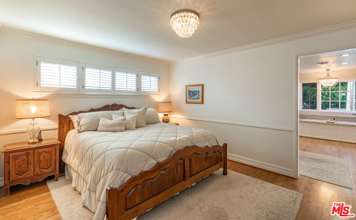 875 Hugo Reid Drive Arcadia, CA 91007 - Photo 19 of 53 a bedroom with a bed and a window