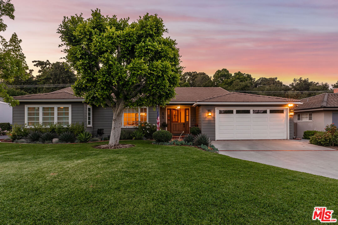 875 Hugo Reid Drive Arcadia, CA 91007 - Photo 2 of 53 a front view of a house with a yard and garage