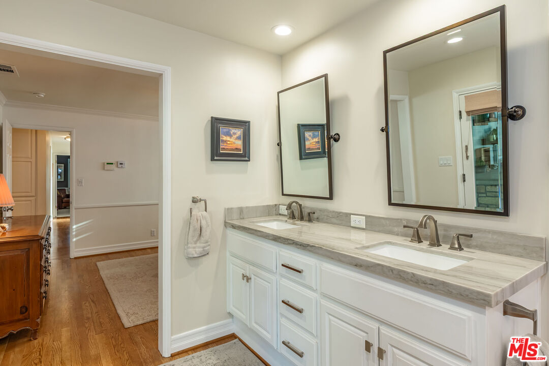875 Hugo Reid Drive Arcadia, CA 91007 - Photo 21 of 53 a bathroom with a sink double vanity and a mirror