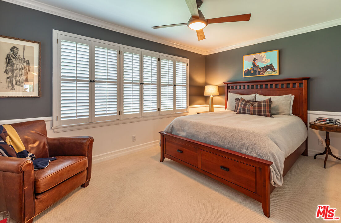 875 Hugo Reid Drive Arcadia, CA 91007 - Photo 29 of 53 a spacious bedroom with a bed and a couch