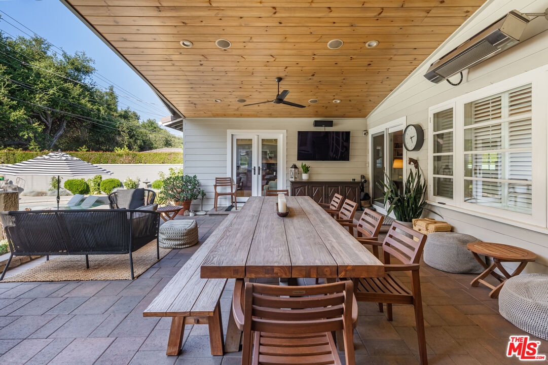 875 Hugo Reid Drive Arcadia, CA 91007 - Photo 34 of 53 a outdoor living space with furniture and a flat screen tv