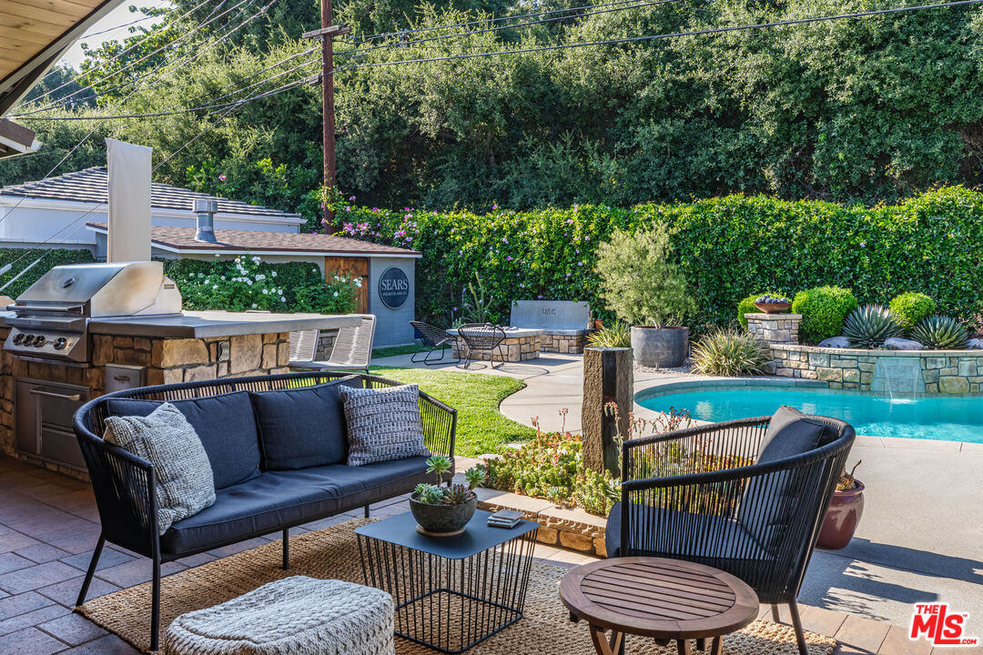 875 Hugo Reid Drive Arcadia, CA 91007 - Photo 37 of 53 a patio with patio a couch and chairs