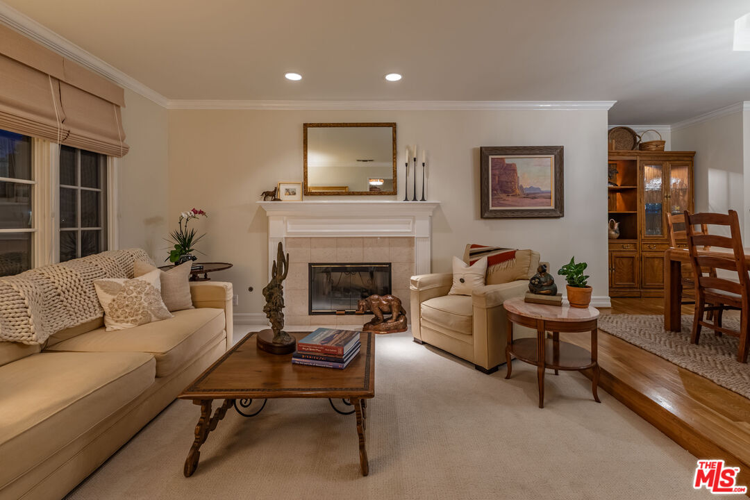 875 Hugo Reid Drive Arcadia, CA 91007 - Photo 44 of 53 a living room with furniture and a fireplace
