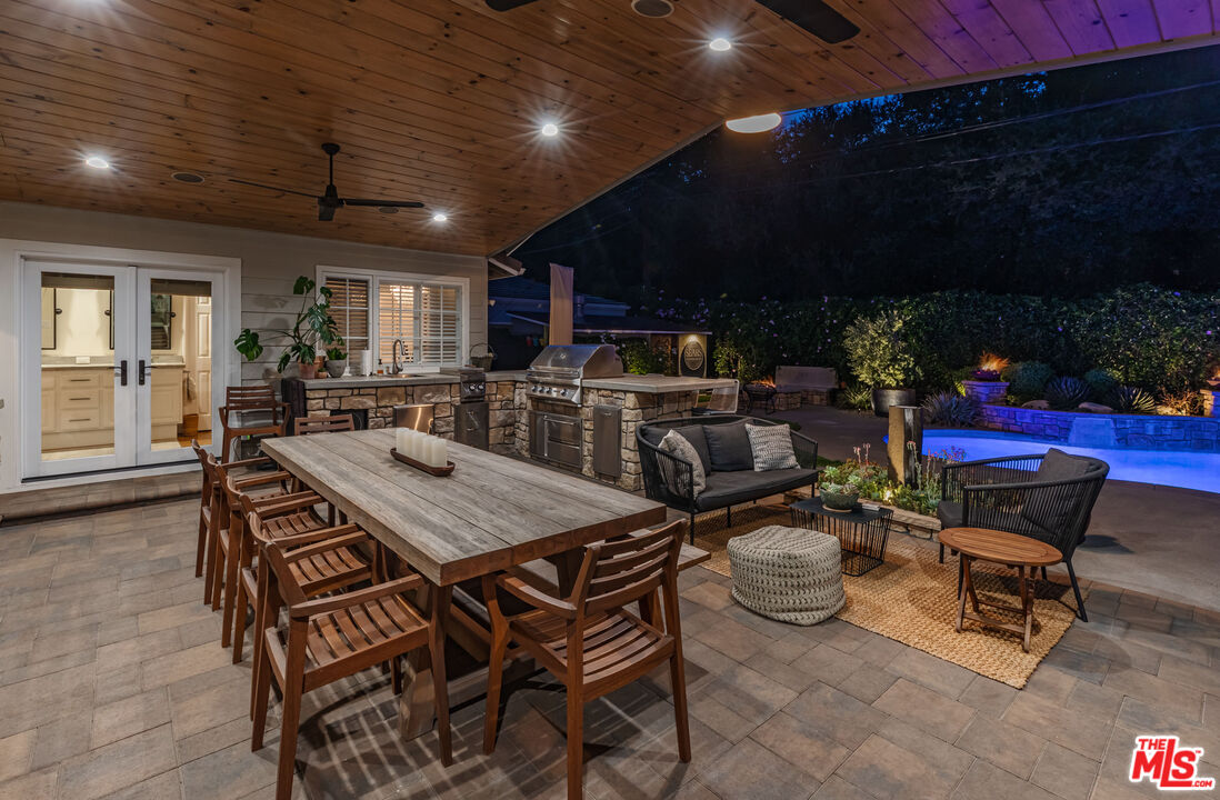 875 Hugo Reid Drive Arcadia, CA 91007 - Photo 46 of 53 a view of a dinning table and chairs in the patio