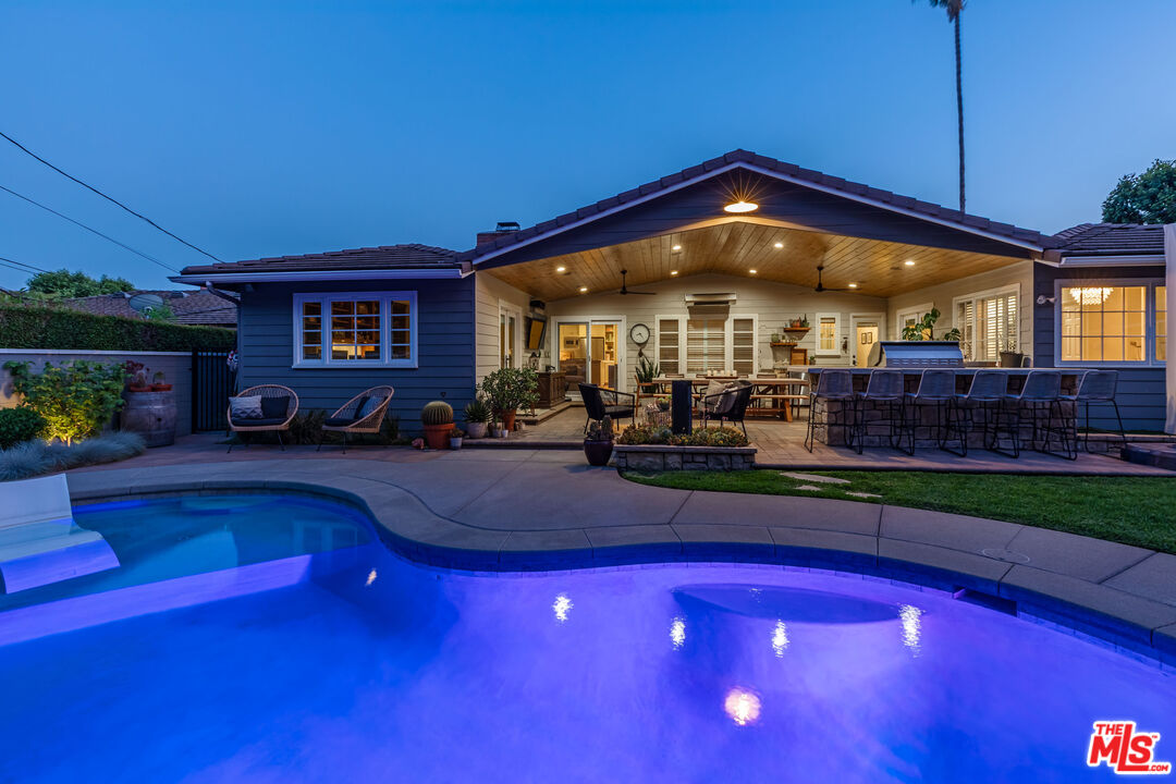 875 Hugo Reid Drive Arcadia, CA 91007 - Photo 48 of 53 a view of a house with a swimming pool yard and sitting area
