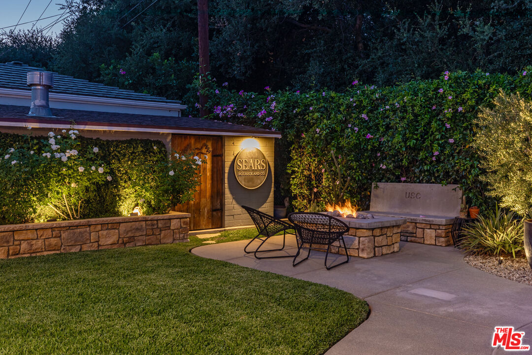 875 Hugo Reid Drive Arcadia, CA 91007 - Photo 50 of 53 a view of a chair and table in the garden