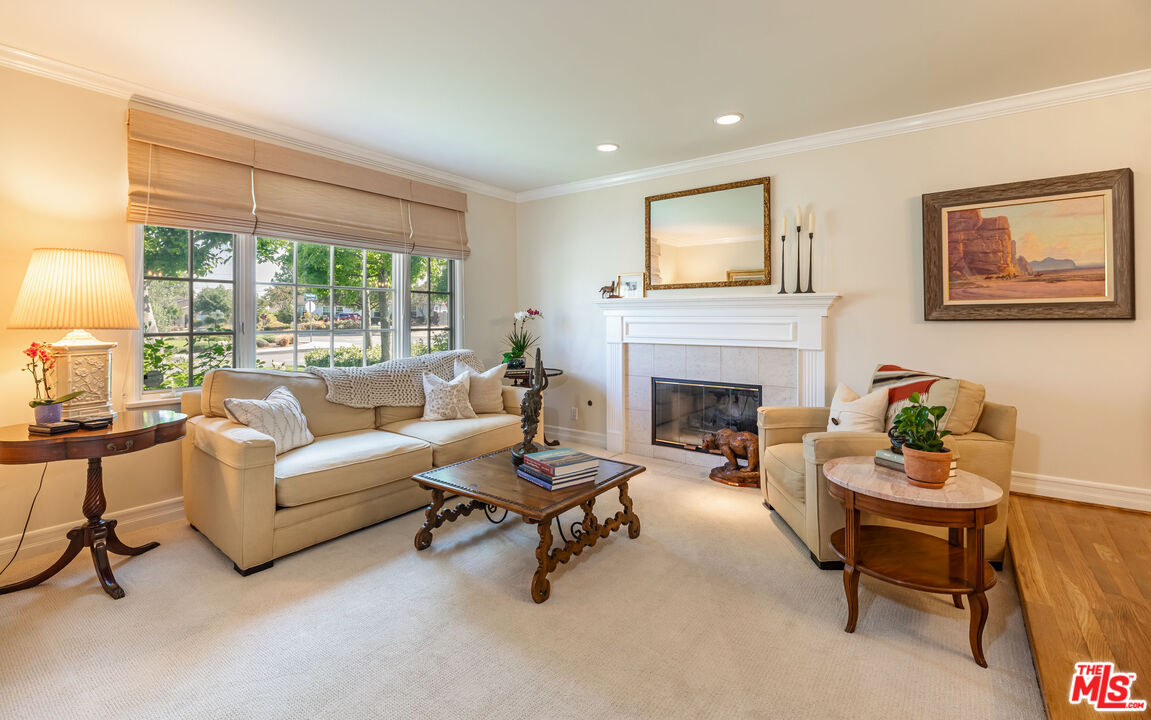 875 Hugo Reid Drive Arcadia, CA 91007 - Photo 6 of 53 a living room with furniture and a fireplace