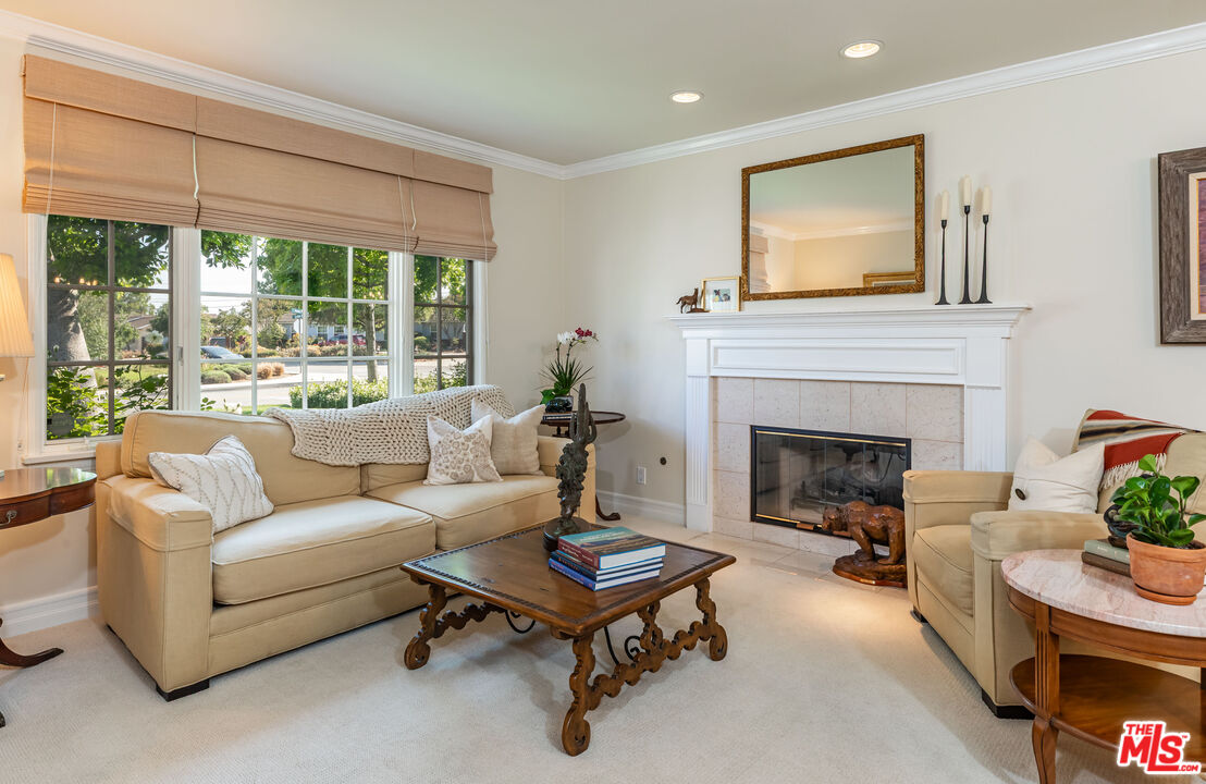 875 Hugo Reid Drive Arcadia, CA 91007 - Photo 7 of 53 a living room with furniture and a fireplace
