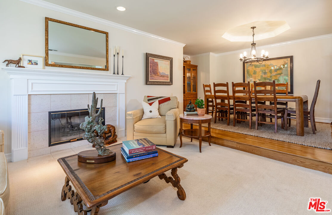 875 Hugo Reid Drive Arcadia, CA 91007 - Photo 8 of 53 a living room with furniture and a fireplace