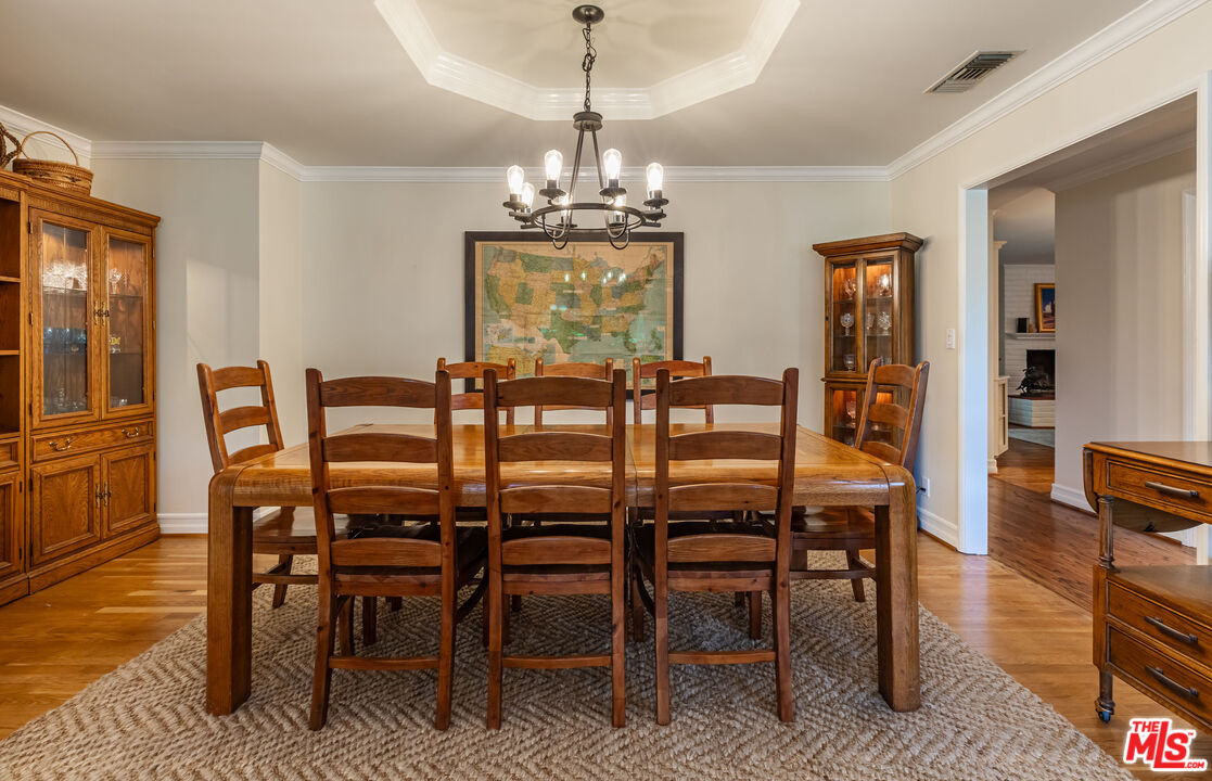 875 Hugo Reid Drive Arcadia, CA 91007 - Photo 9 of 53 a dining room with furniture a chandelier and window