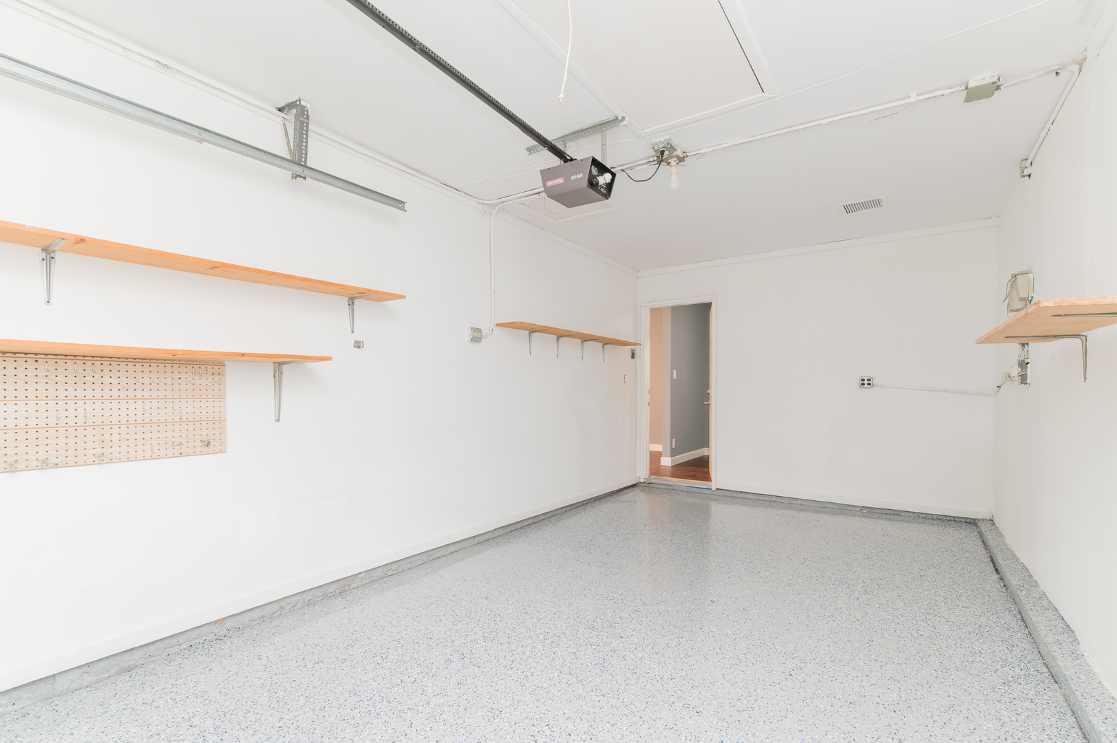 734 Surrey Drive Streamwood, IL 60107 - Photo 28 of 36 a view of a room with an empty space