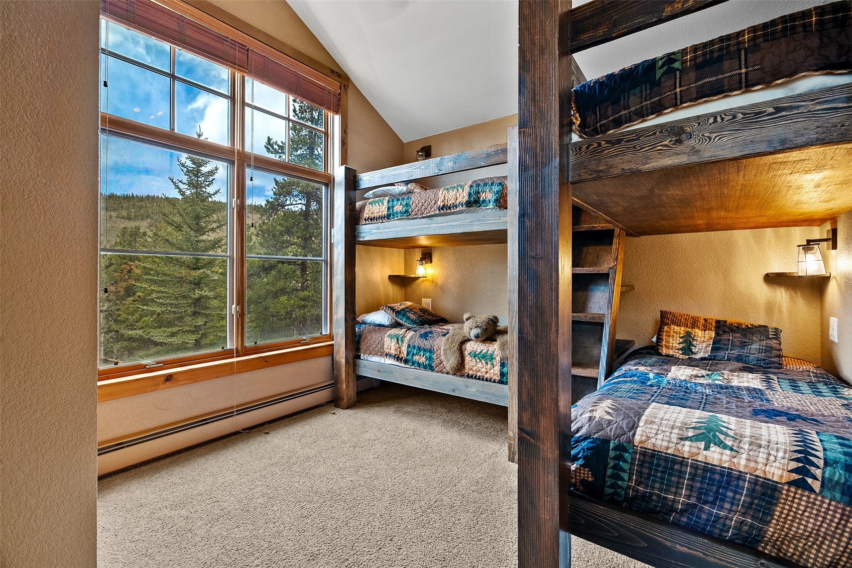 57 Lake Ridge Circle, Unit 1848 Keystone, CO 80435 - Photo 23 of 49 a bedroom with furniture and a large window