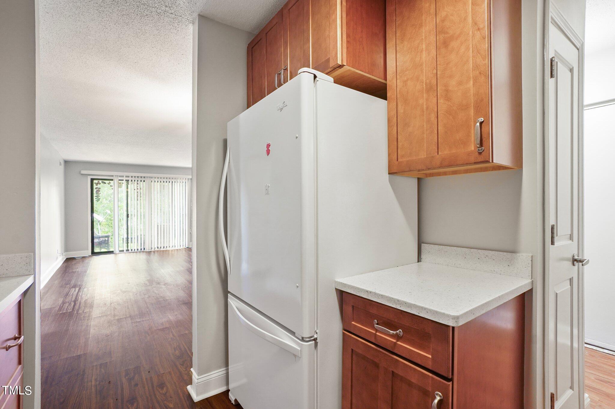 5104 Flint Ridge Place Raleigh, NC 27609 - Photo 5 of 16 a view of a kitchen with a sink and dishwasher