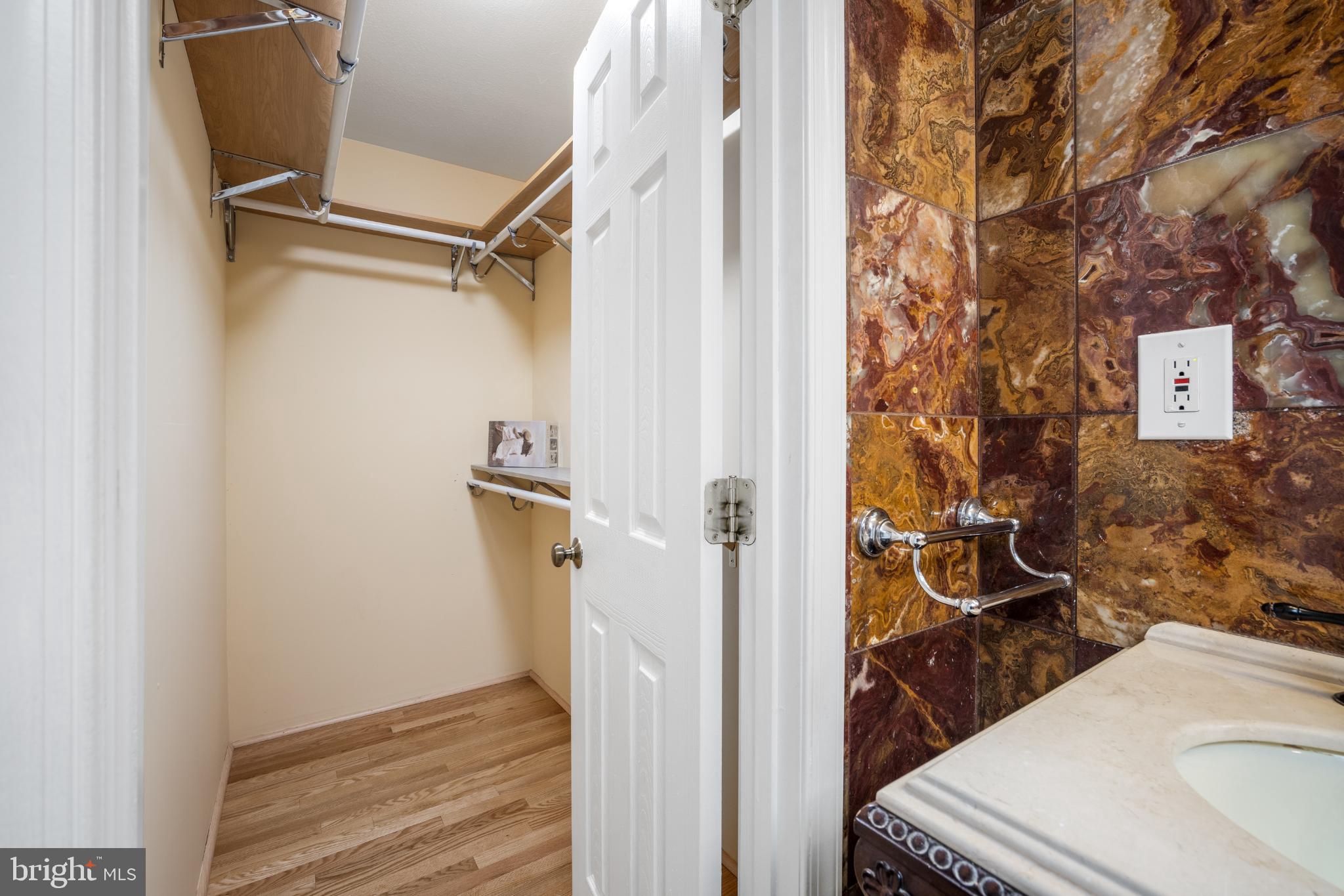 4104 Tulare Drive Silver Spring, MD 20906 - Photo 21 of 44 a bathroom with a sink and mirror with toilet