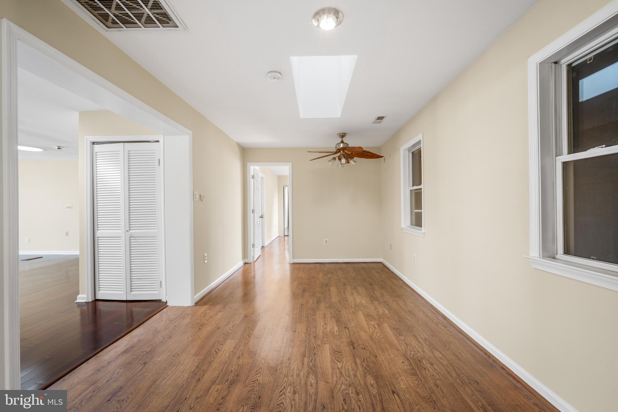 4104 Tulare Drive Silver Spring, MD 20906 - Photo 22 of 44 wooden floor in an empty room with a window