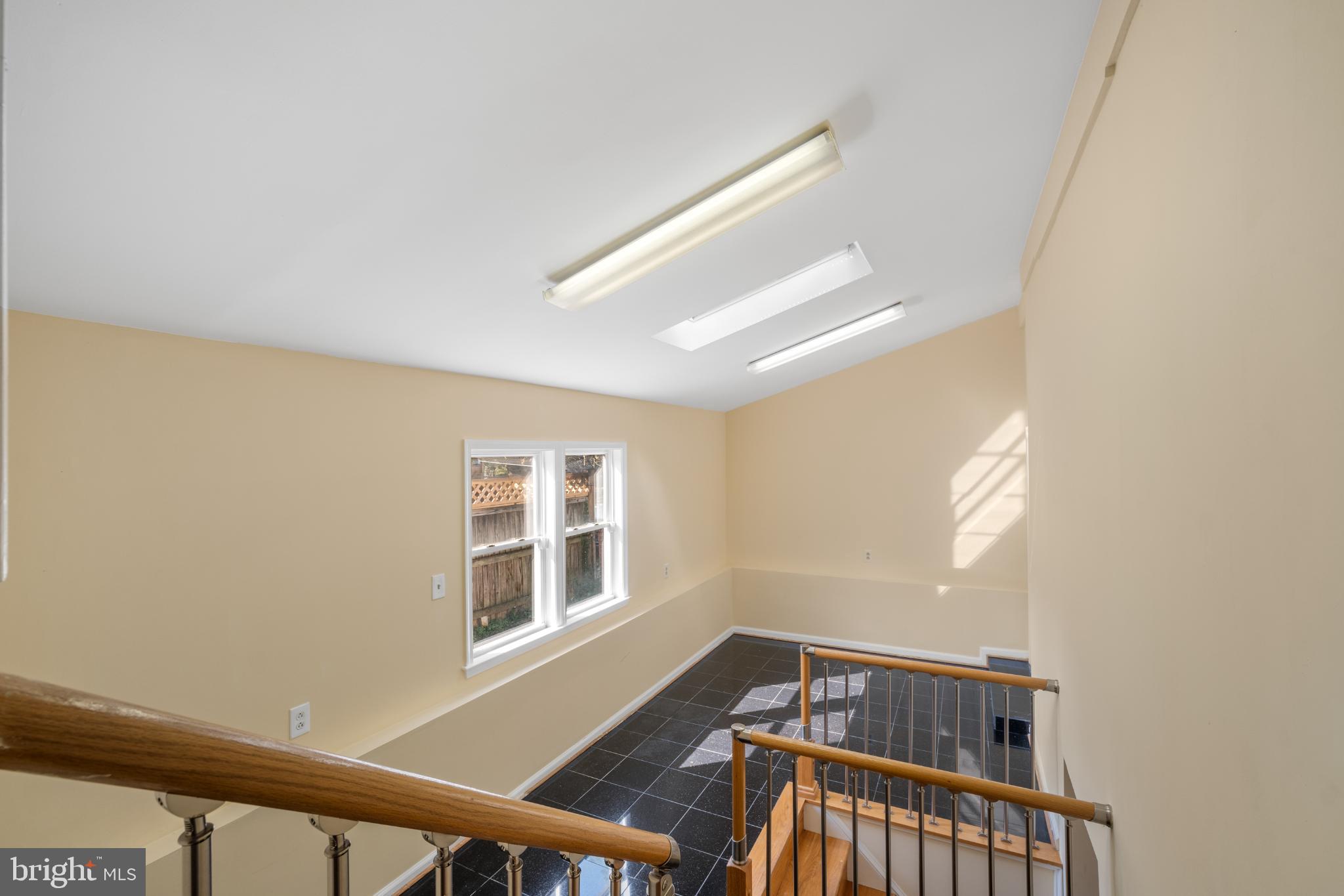 4104 Tulare Drive Silver Spring, MD 20906 - Photo 29 of 44 a view of a hallway with windows