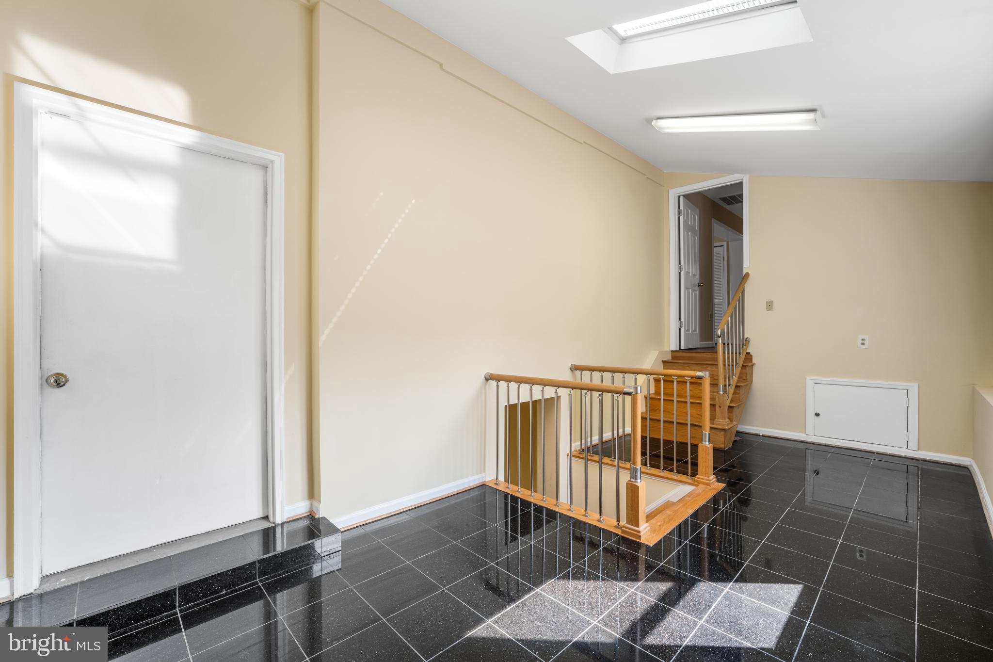 4104 Tulare Drive Silver Spring, MD 20906 - Photo 30 of 44 a view of entryway with wooden floor