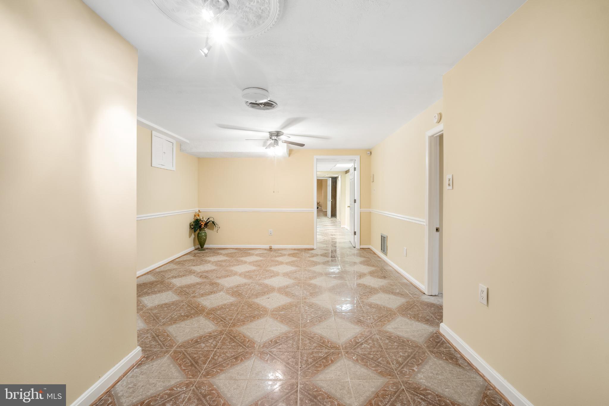 4104 Tulare Drive Silver Spring, MD 20906 - Photo 38 of 49 Spacious, inviting entryway with elegant tiles.