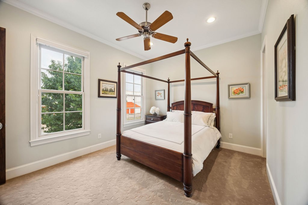 2508 Brun Street Houston, TX 77019 - Photo 42 of 50 This fourth bedroom has neutral walls, and carpeted flooring. It's brightened by two large windows, and a ceiling fan adds comfort. For convenience it also has an ensuite bath.