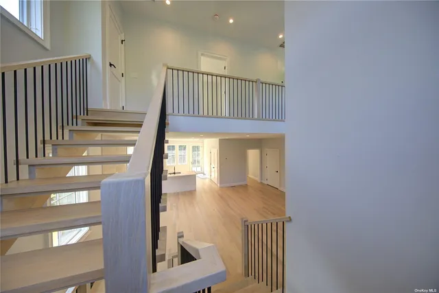 a view of an entryway with wooden floor