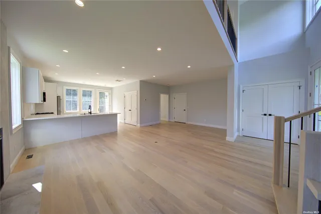 a view of a livingroom with wooden floor