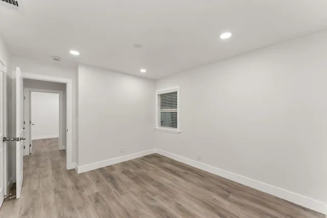 a bathroom with a sink toilet and vanity