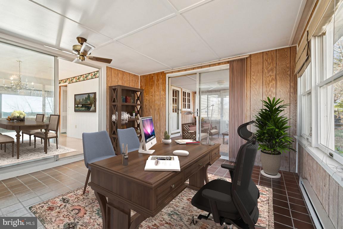 2701 Carrollton Road Finksburg, MD 21048 - Photo 22 of 66 a living room with furniture a window and a table