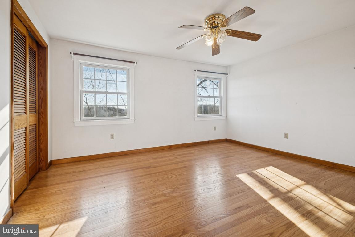 2701 Carrollton Road Finksburg, MD 21048 - Photo 40 of 66 a view of empty room with wooden floor and fan