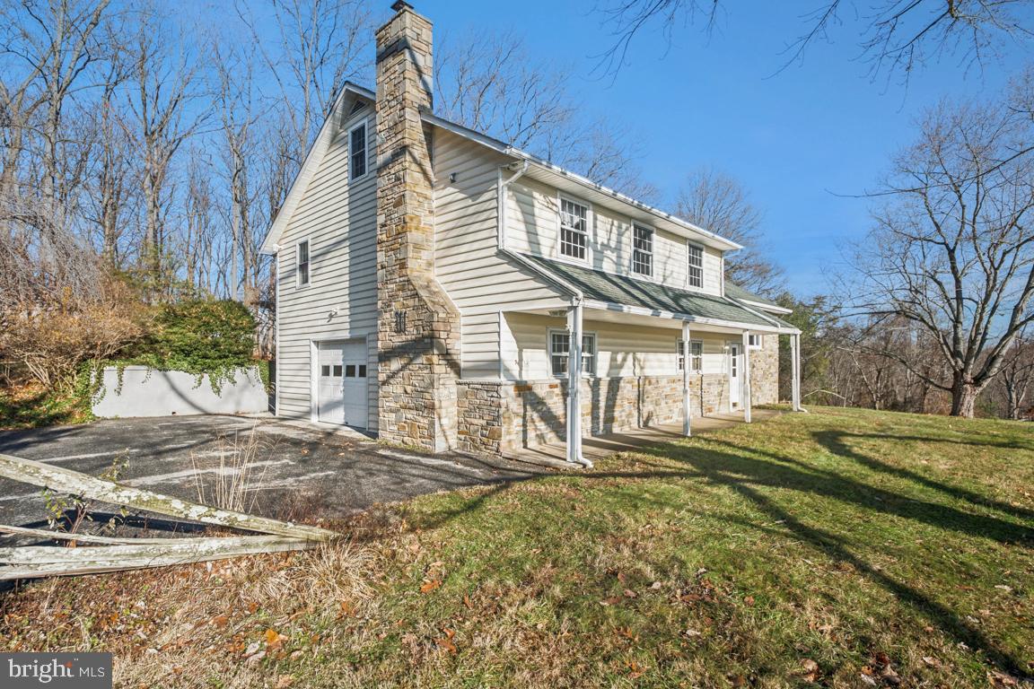 2701 Carrollton Road Finksburg, MD 21048 - Photo 7 of 66 a front view of a house with a yard