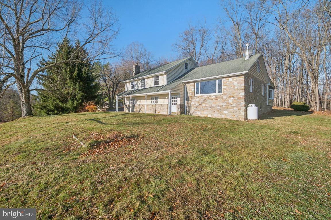 2701 Carrollton Road Finksburg, MD 21048 - Photo 8 of 66 a front view of a house with a yard