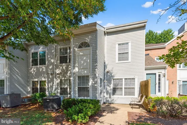 a front view of a house with a porch
