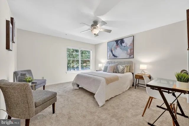 a bed room with a bed and a couch