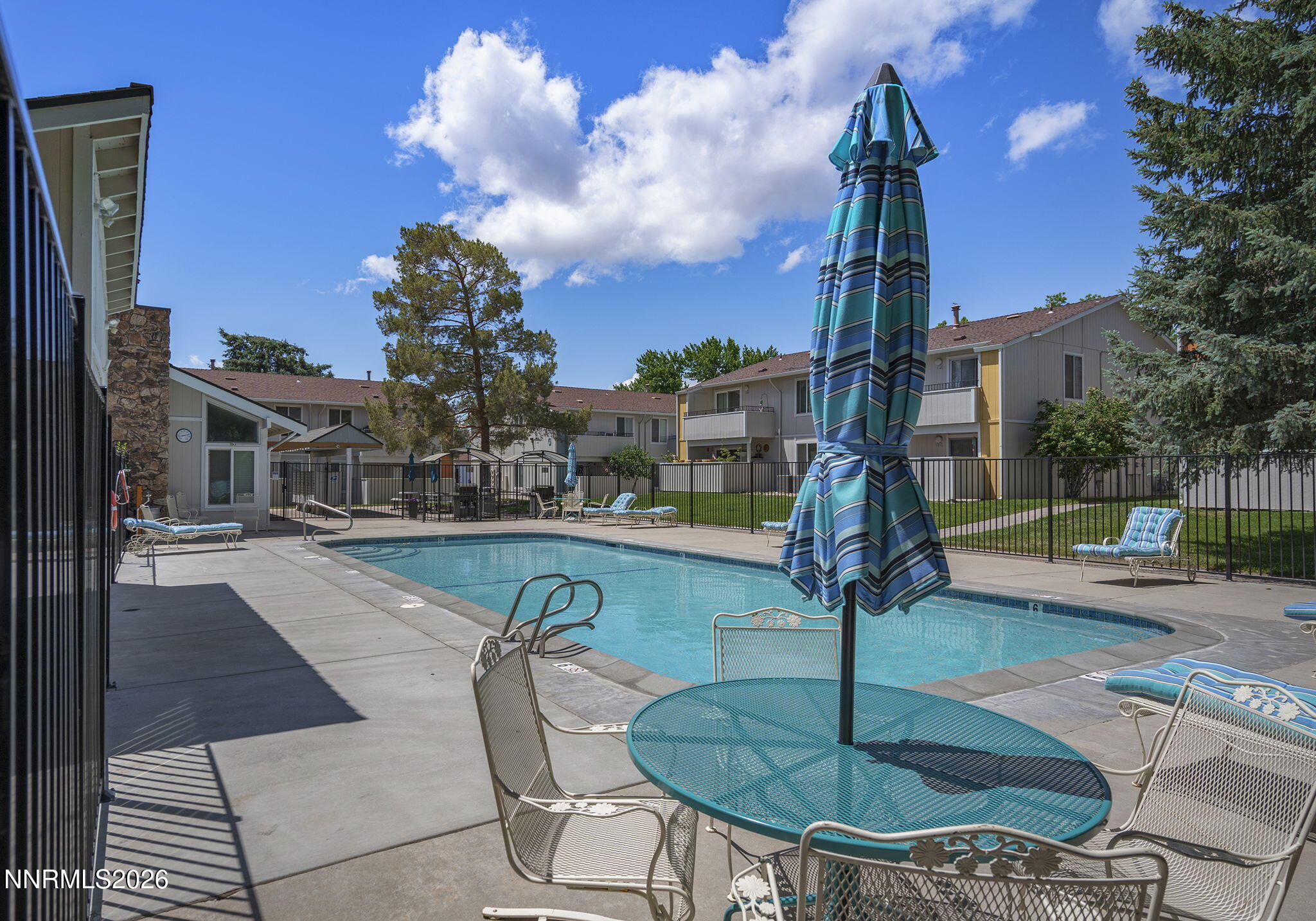 400 South Saliman Road, Unit 129 Carson City, NV 89701 - Photo 15 of 15 a swimming pool view with a outdoor seating space